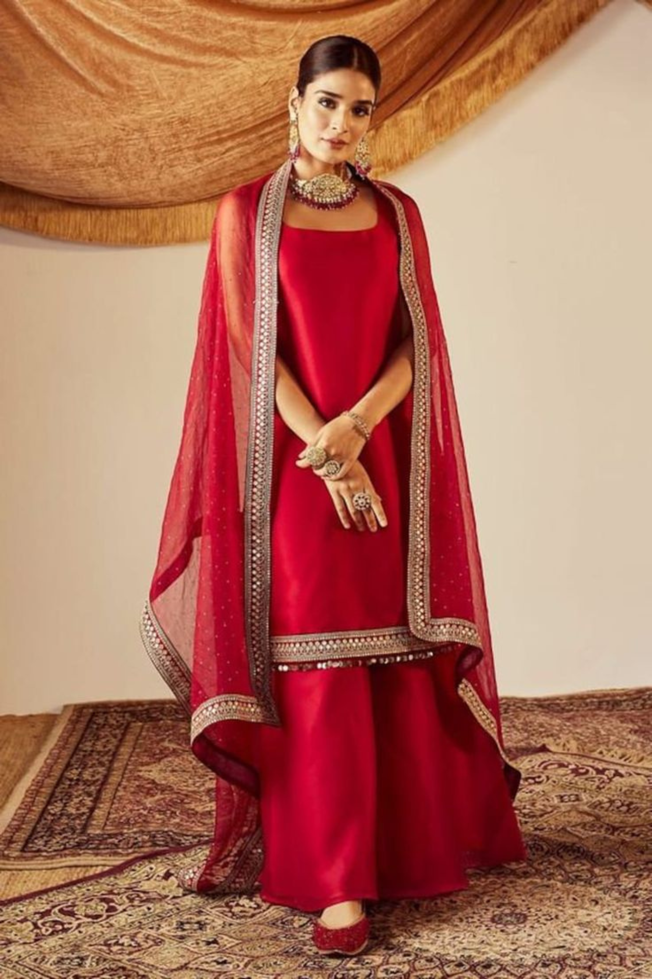 red panjabi suit